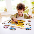 Hape - Wooden Construction Vehicle Peg Puzzle