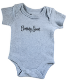 'Coming soon' baby onesie (short-sleeve