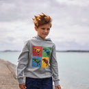 Child wearing a hoodie with colorful dinosaur design by the water
