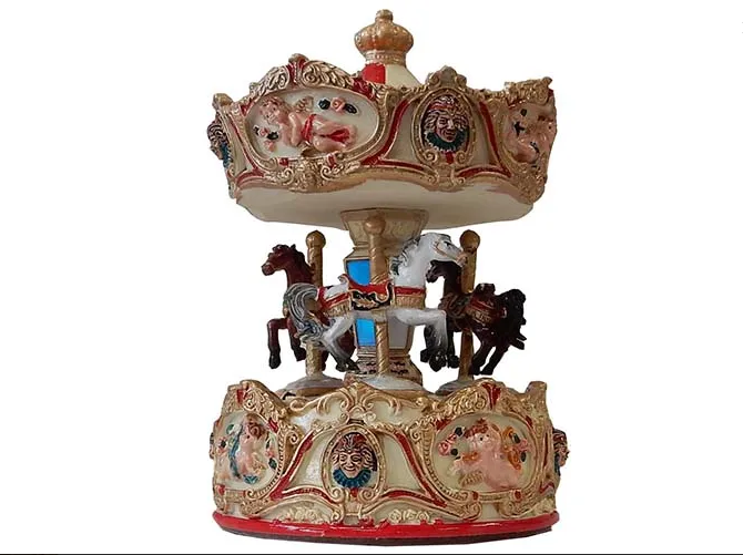 CAROUSEL MUSICAL REVOLVING RED/WH 15CM RRP$49.99